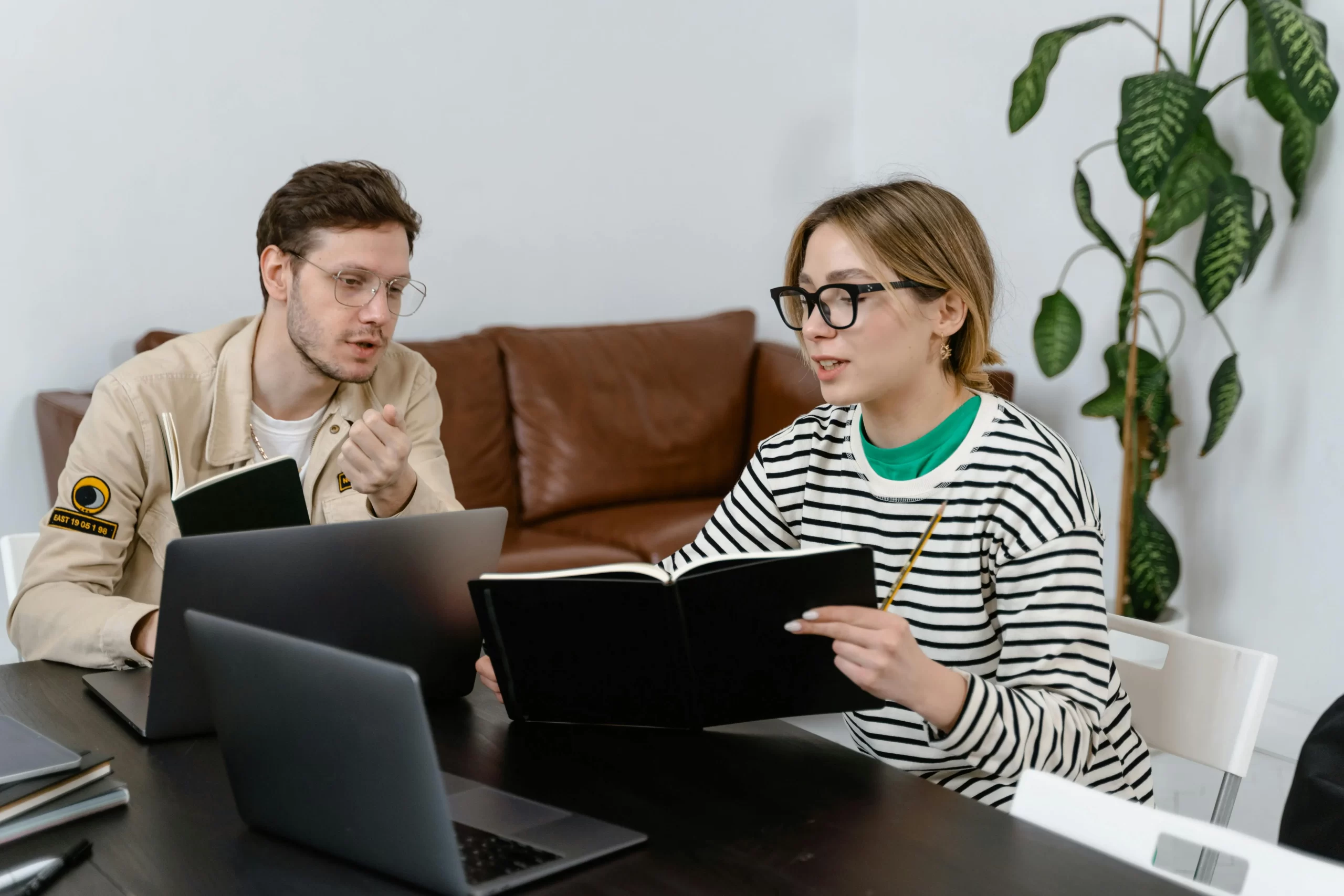 Two People Discussing Online Plans